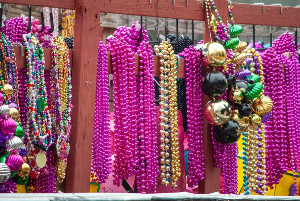 Beads and other throws hung up and waiting for the Mardi Gras parade to begin