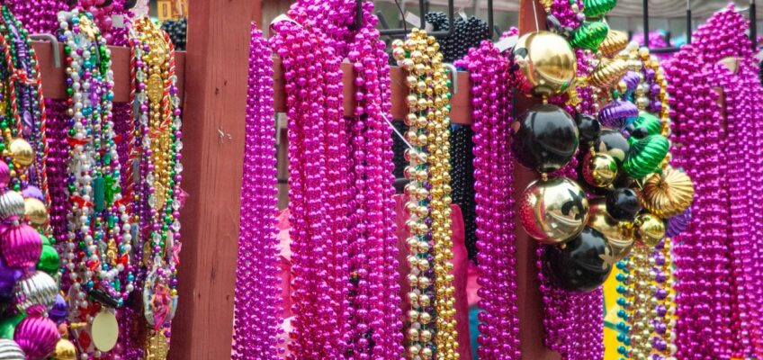 Beads and other throws hung up and waiting for the Mardi Gras parade to begin